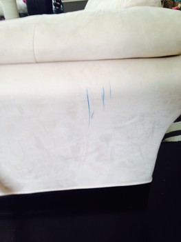 Customers children used blue ink on white sofa, she tried many different toxic store bought chemicals to remove the ink with no improvement. We used our premium eco-stain remover and saw significant improvement. Vernon Hills IL
